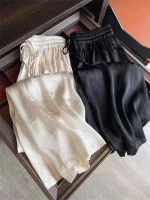 pantalon large en tissu de soie blanc