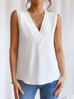 haut en soie blanc sans manches